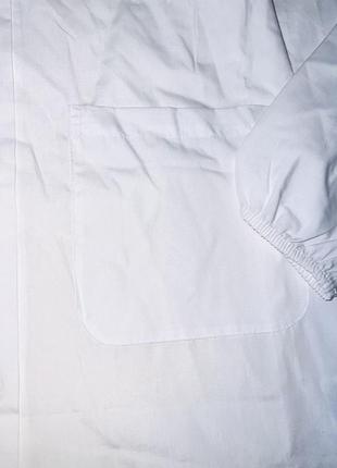 Платя- халат білого кольору на гудзиках, з карманчиками, з білим комірцем. бренд: ovs розмір: 📌 1405 фото