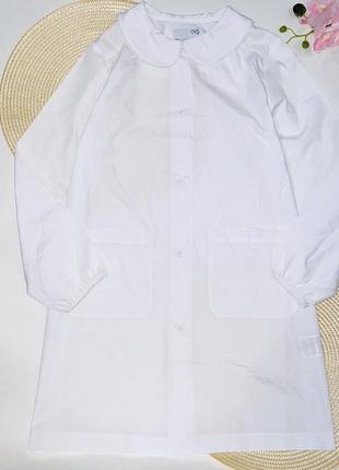 Платя- халат білого кольору на гудзиках, з карманчиками, з білим комірцем. бренд: ovs розмір: 📌 1407 фото