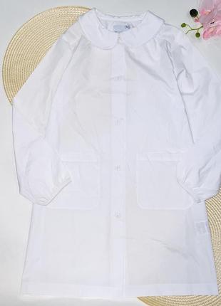 Платья- халат белого цвета на пуговицах, с карманчиками, с белым воротничком. бренд: ovs размер: 📌 140