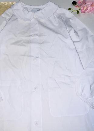 Платя- халат білого кольору на гудзиках, з карманчиками, з білим комірцем. бренд: ovs розмір: 📌 1408 фото