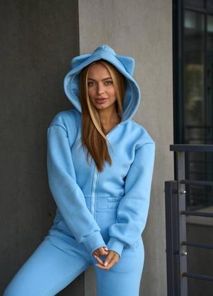 Теплий жіночий комбінезон з вушками на флісі блакитний
