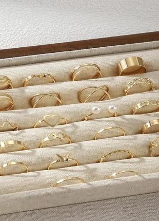 Набор золотистых колец 22 шт
