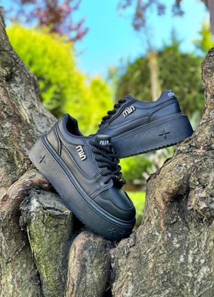 Чорні кросівки трендові на високій підошві