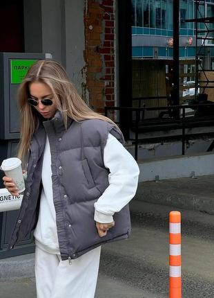 Женская жилетка