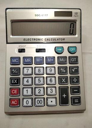 Настільний калькулятор, кишеньковий. подвійне живлення.