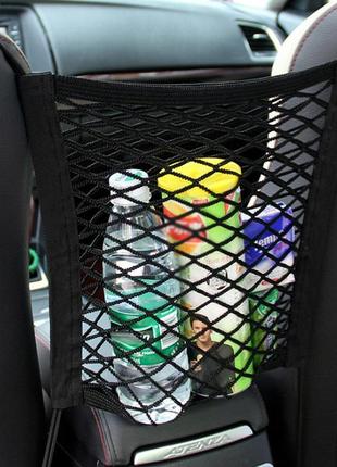Автомобільна сітка органайзер між сидіння universal car seat storage1 фото