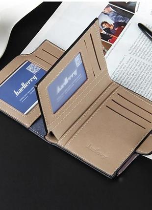 Мужской кошелёк портмоне материал искусственная кожа с надписью  цвет черный2 фото