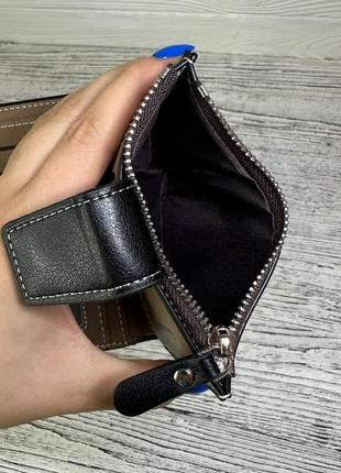 Чоловічий гаманець портмоне матеріал штучна шкіра з написом колір чорний9 фото
