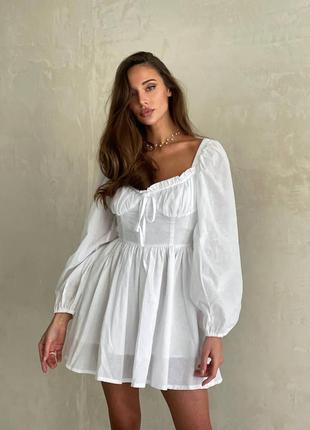 Однотонна бавовняна сукня erika з імітацією корсета білого кольору4 фото