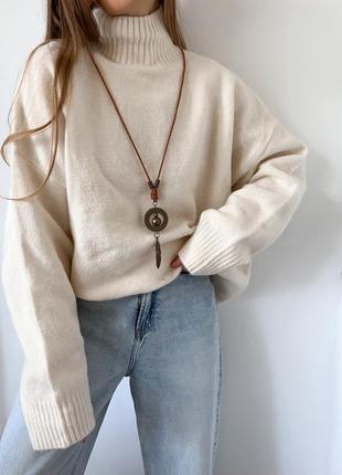 Молочний оверсайз светр  zara з високим горлом