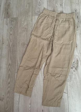 Прямые брюки в полоску