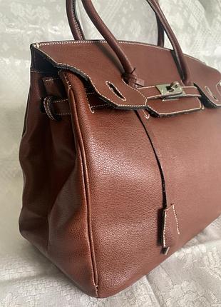 Гарна комфортна практична шкіряна сумка