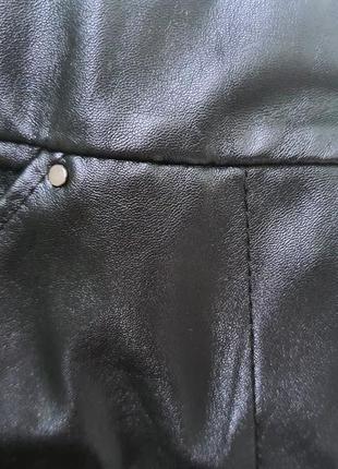 Спідниця з екошкіри з кишенями5 фото