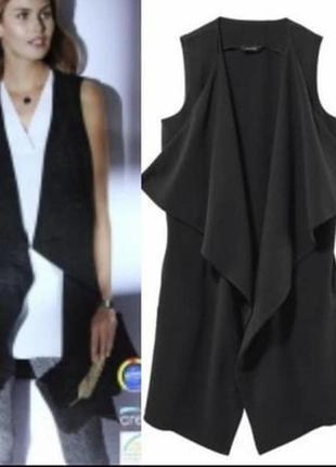 Довгий жилет з кишенями