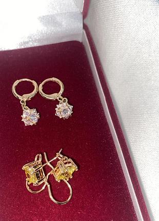 Сережки 2 пари. 1 пара с желтыми цирконами 2 пары серьги кольца. медицинское золото