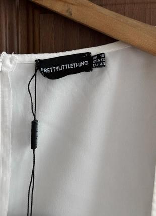 Белое платье с объемными рукавами