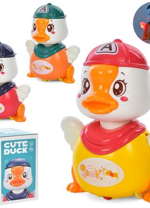 Музыкальная игрушка 986a утка 17см, звук, свет, танцует, 3 цвета, на батарейке, в коробке, 11-17-11см