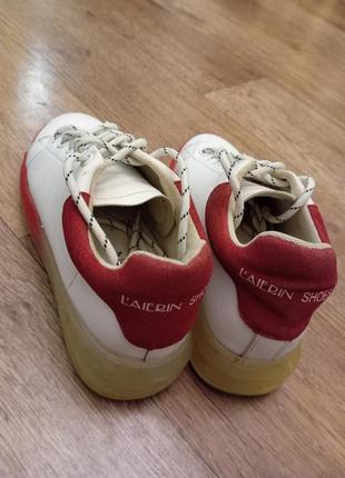 Белые кроссовки с красной подошвой.laierin shoes.4 фото