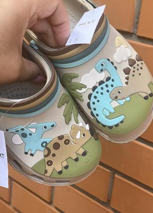 Крокси в динозаври клоги next в наявності