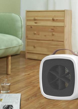 Портативний тепловентилятор fan heater жовтий тепло нагрівач нагрівач тепловий вентилятор4 фото