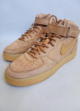 Шкіряні кросівки nike air force1 фото