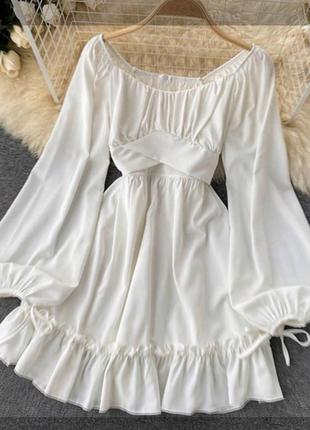 Біла сукня міні. розмір с, невеличка м1 фото