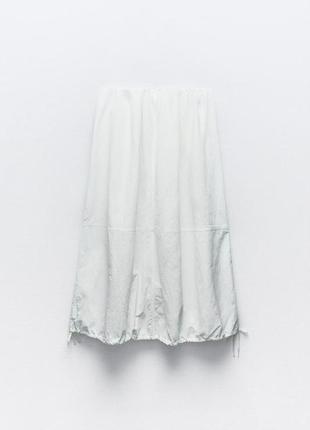 Нейлоновая юбка-балон средней длины7 фото