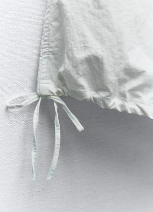 Нейлоновая юбка-балон средней длины9 фото