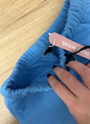 Нові спортивні штани