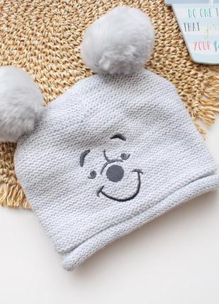 Сіра зимова в'язана  шапка з вінні пухом  george 12-18 міс
