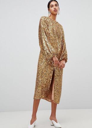 Золота блискуча сукня міді з паєтками та пишними рукавами