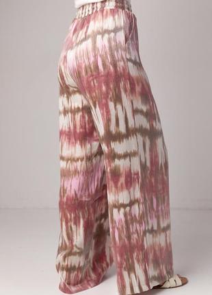 Летние прямые брюки на резинке с абстрактным принтом5 фото