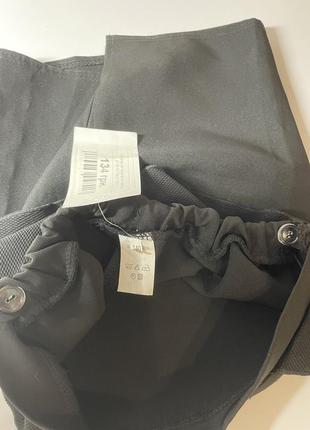Новая черная юбка с разрезом и оборкой для девочки 9-11 лет6 фото