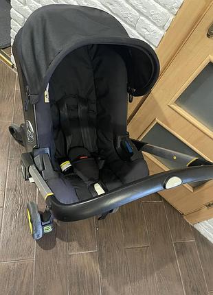 Автолюлька на колесах