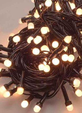 Гірлянда лінза 100led теплий білий 7м. чорний провід 1291-07 тм китай