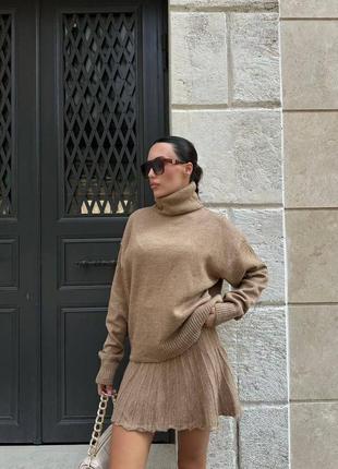 Трендовый вязаный костюм с юбкой и свитером oversize