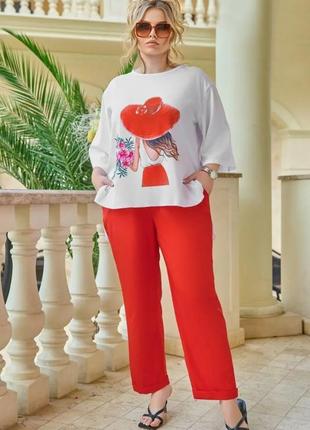 Брючний костюм-двійка з принтом брюки і блуза