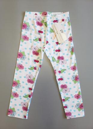 Яркие лосины/капри с цветочками от бренда osv