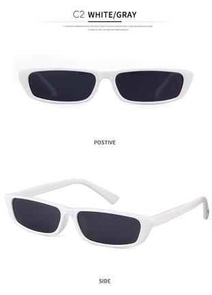 Белые солнцезащитные очки с черными линзами4 фото