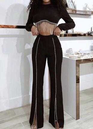 Черный брючный костюм с стразами штаны клеш