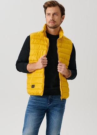 Стеганая теплая жилетка