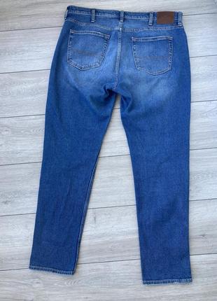 Синие мужские джинсы6 фото
