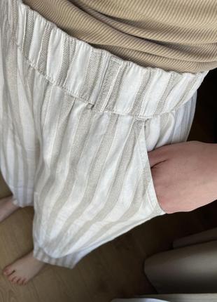 Світлі льняні штани в полоску george8 фото