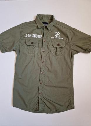 Рубашка мальчику в стиле милитари хаки pufudi короткий рукав military оливка военный стиль принт3 фото