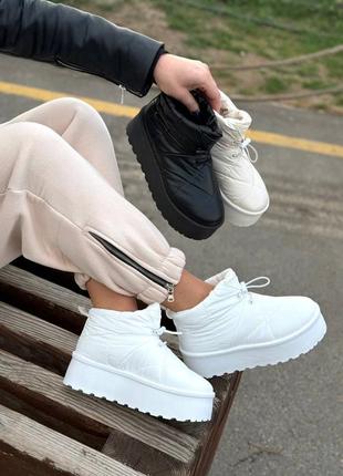 Жіночі зимові дутики на високій підошві.