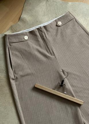 Штани next