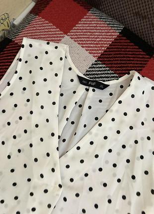 Блузка в горохи