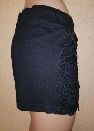 Красиві короткі жіночі трикотажні чорні жіночі шорти з мереживом 12 р. atmosphere5 фото