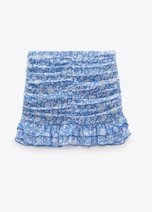 Брендовая юбка с драпировкой из ткани с цветочным принтом zara этикетка5 фото