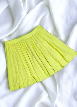 Брендова яскрава спідниця плісе c&amp;a етикетка